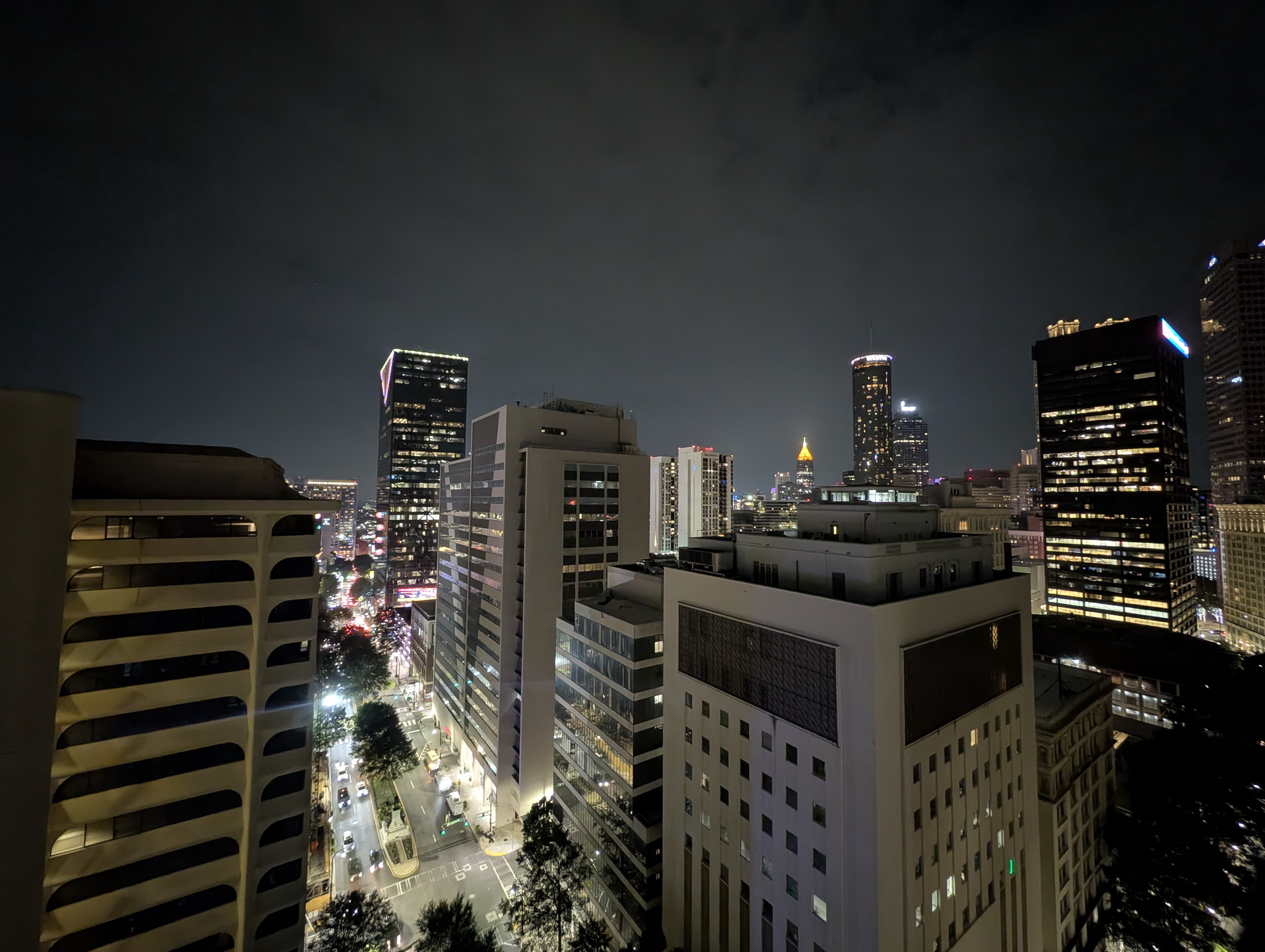 Atlanta at night, with illuminated office buildings and streets among the downtown skyline.